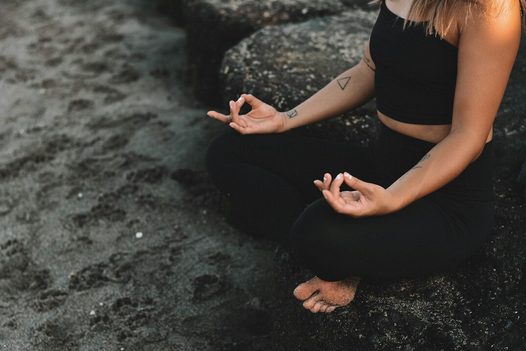 person meditating calmly