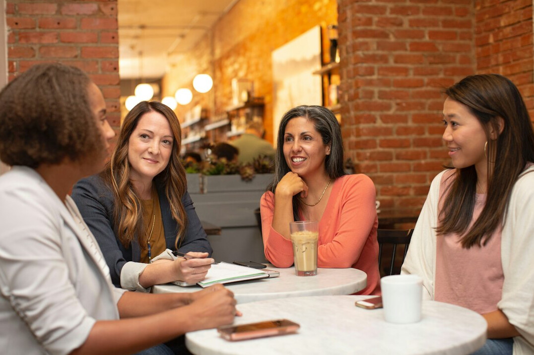 woman leading team meeting
