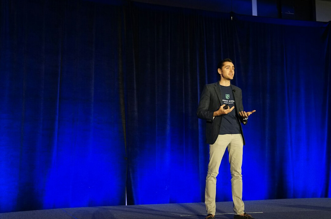 person giving presentation on stage