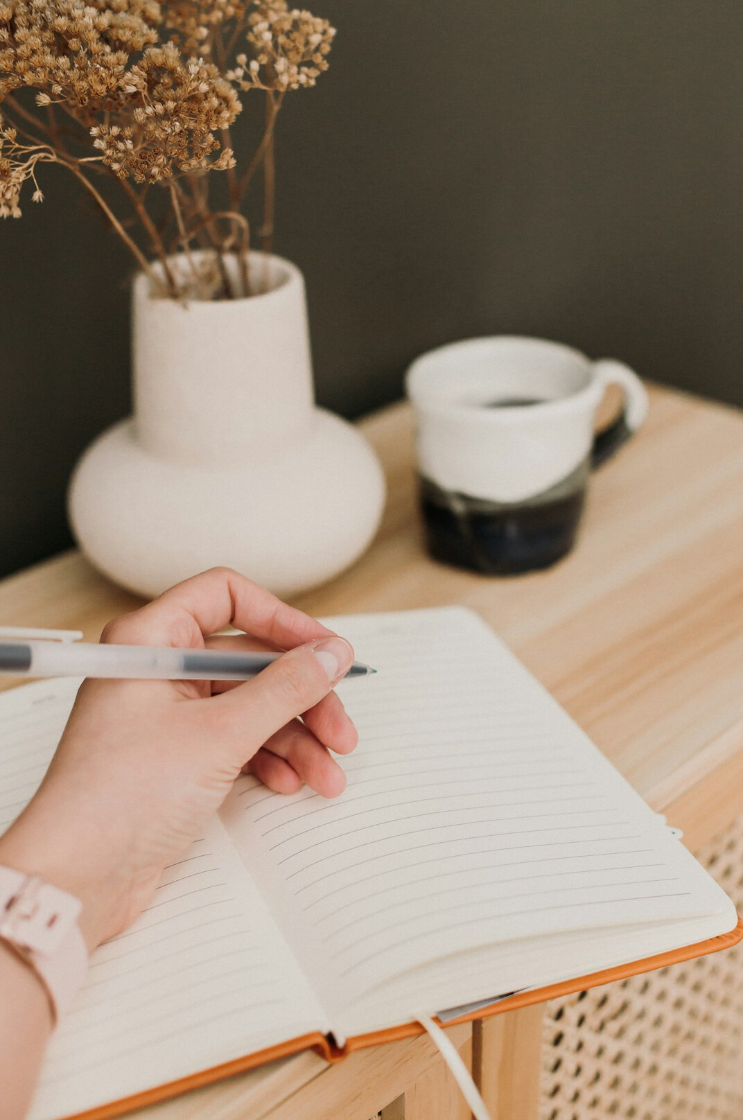 person journaling emotions