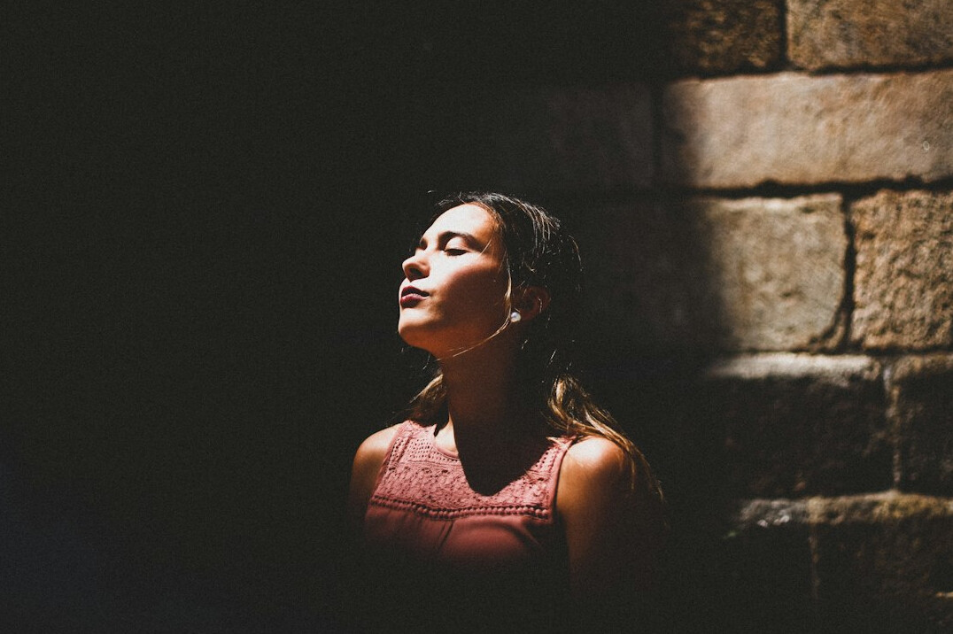 person taking deep breath